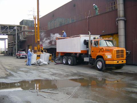 Filling sand filters at a water treatment plant Filling sand filters at a water treatment plant